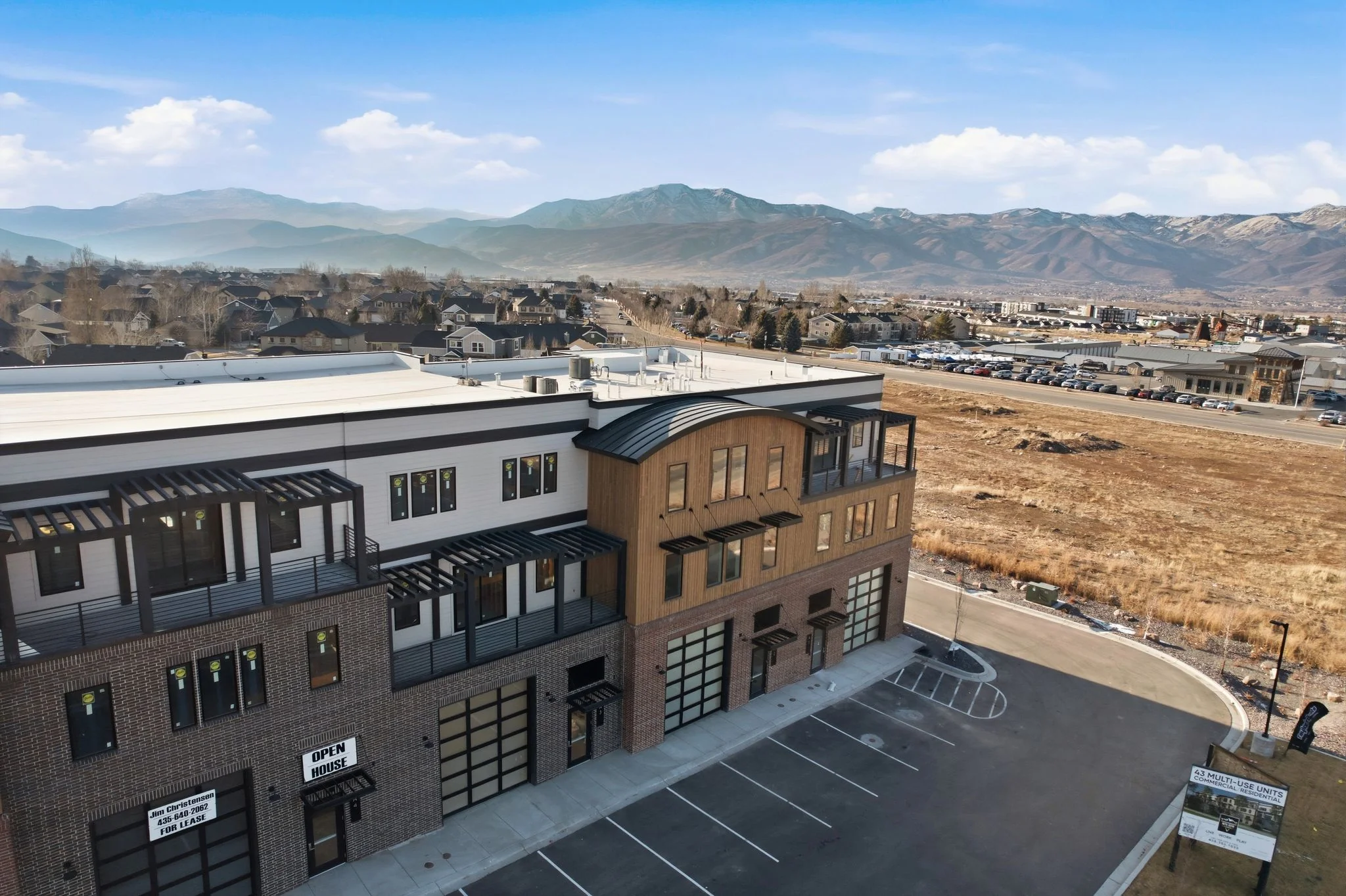 Aerial view of Mountain View Commons with Wasatch Range mountains in the background